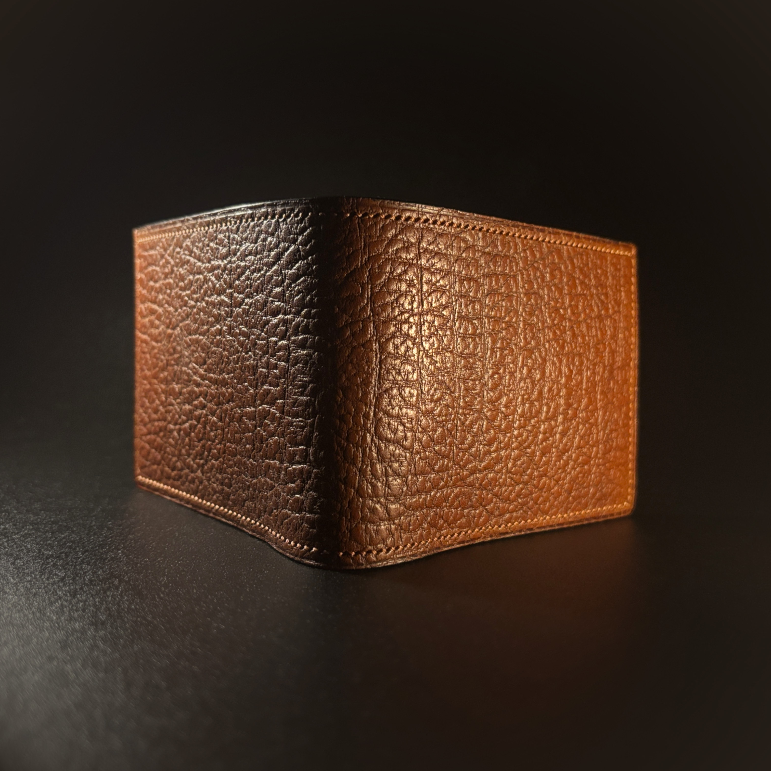 Unique handstitched textured terrracotta brown bifold wallet exterior shell view