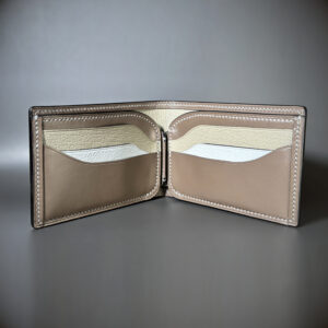 Tan taupe and white bifold wallet with black shell handstitched with white thread interior view