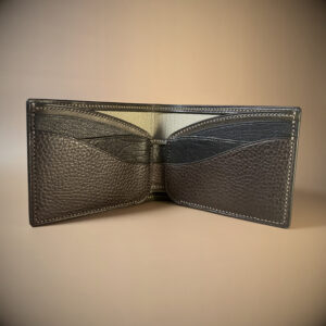 Black brown and tan bifold wallet with brown shell handstitched with taupe thread interior view