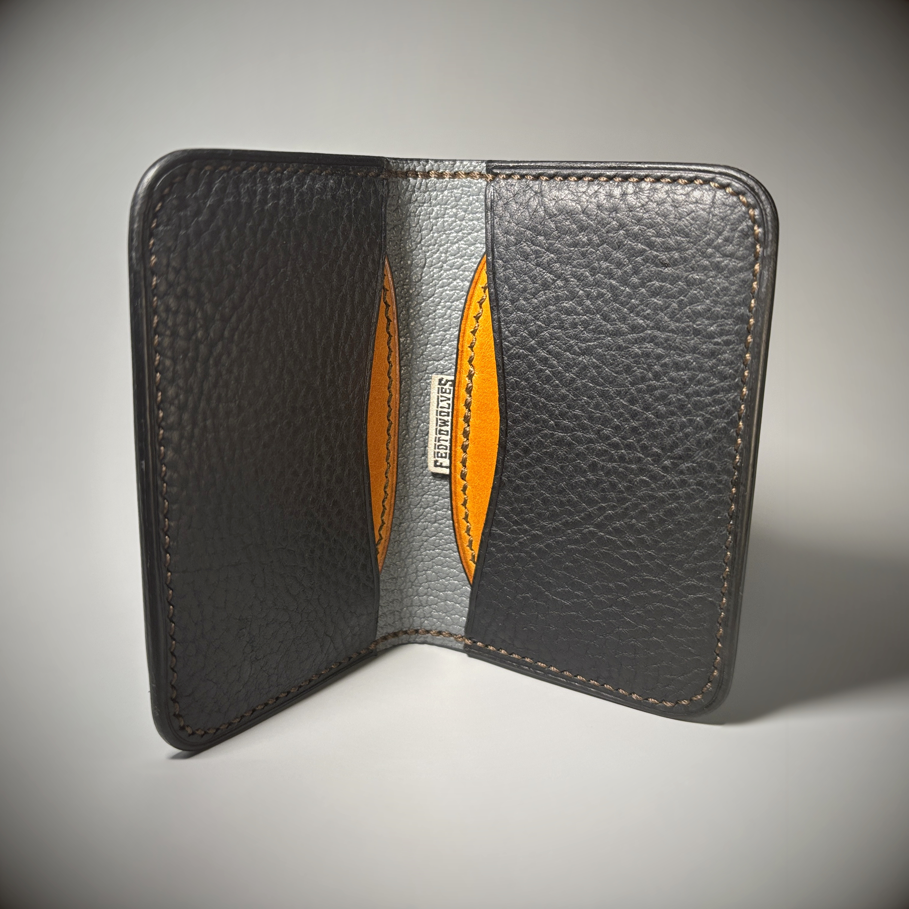 Navy blue ochre and light blue folding handstitched card wallet interior view