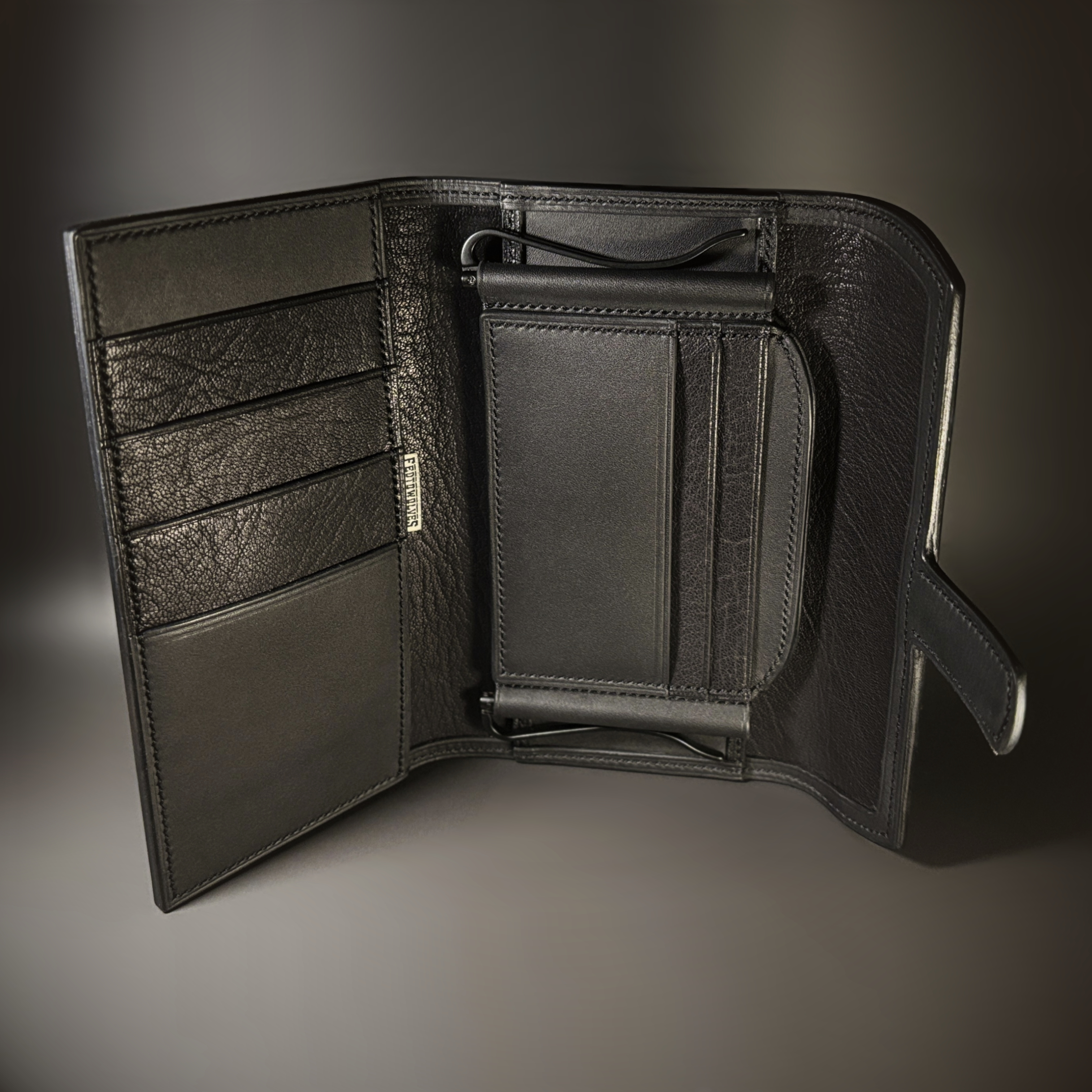 Unique all black hand-stitched tuck strap closure card and cash wallet with money clips interor view