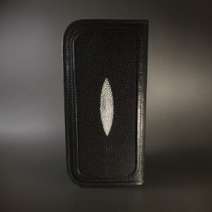 Unique handstitched stingray and quilted shell and black curved interior long wallet side stingray exterior view