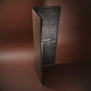 Unique hand-stitched taupe shell and textured black interior cash and card long wallet side view