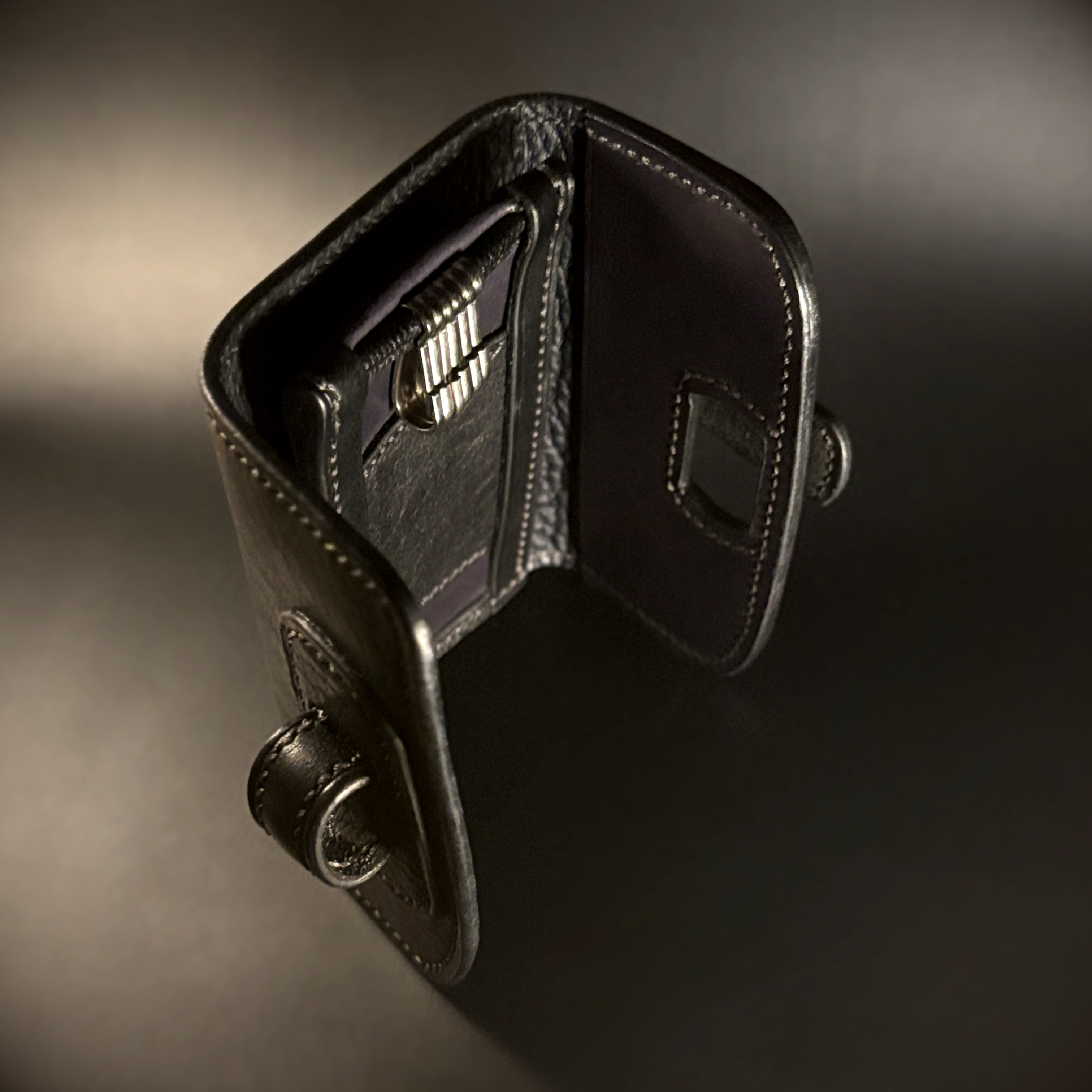 Unique handstitched tuck closure black and blue keyfold with key rings and card or cash slot top view