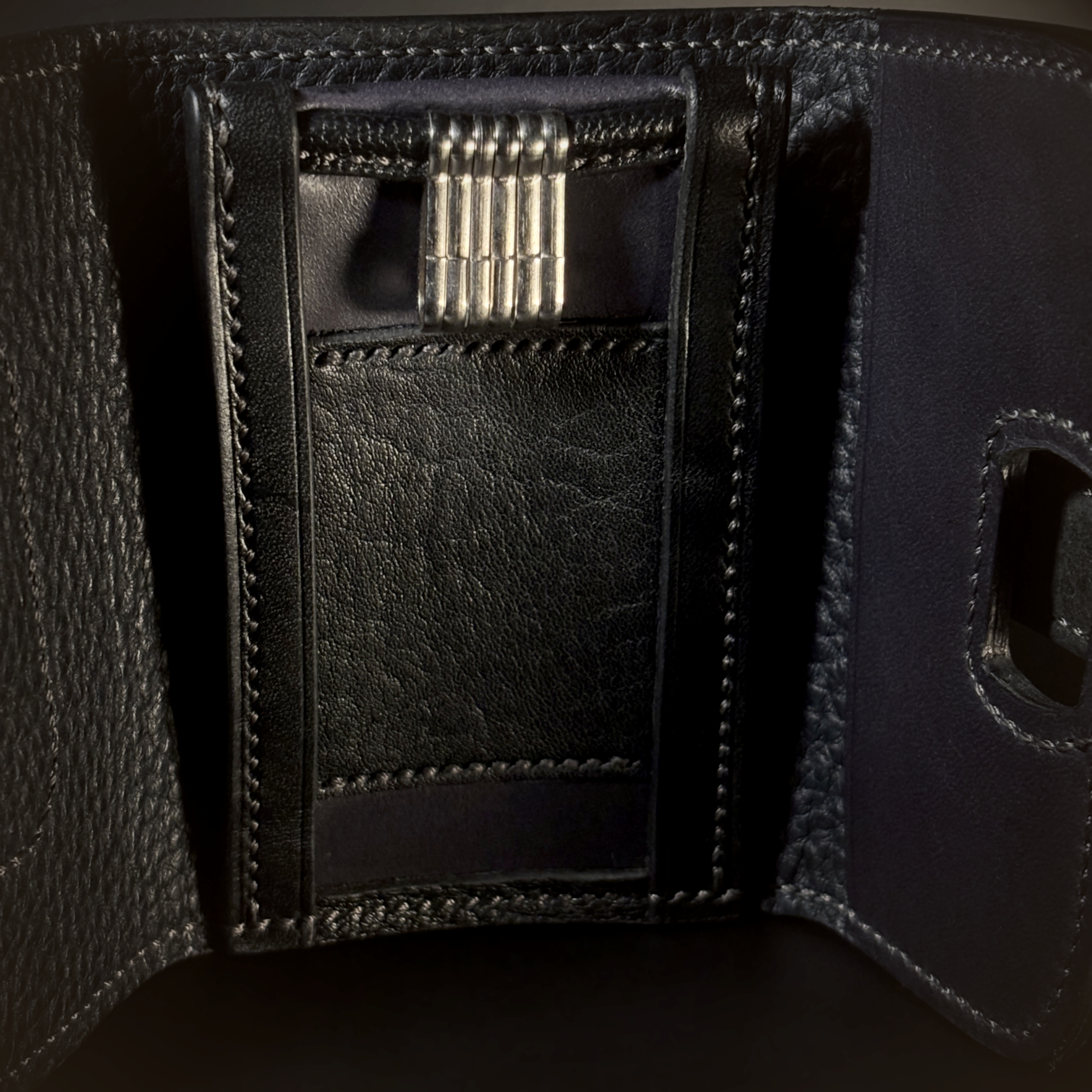 Unique handstitched black and blue keyfold with key rings and card or cash slot interior detail view