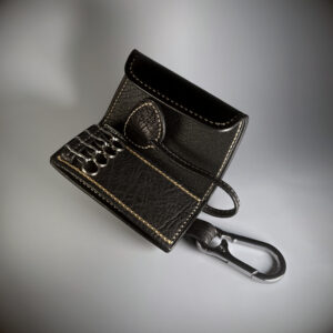 Unique handstitched black keyfold with tuck closure key rings carabiner and leash interior view
