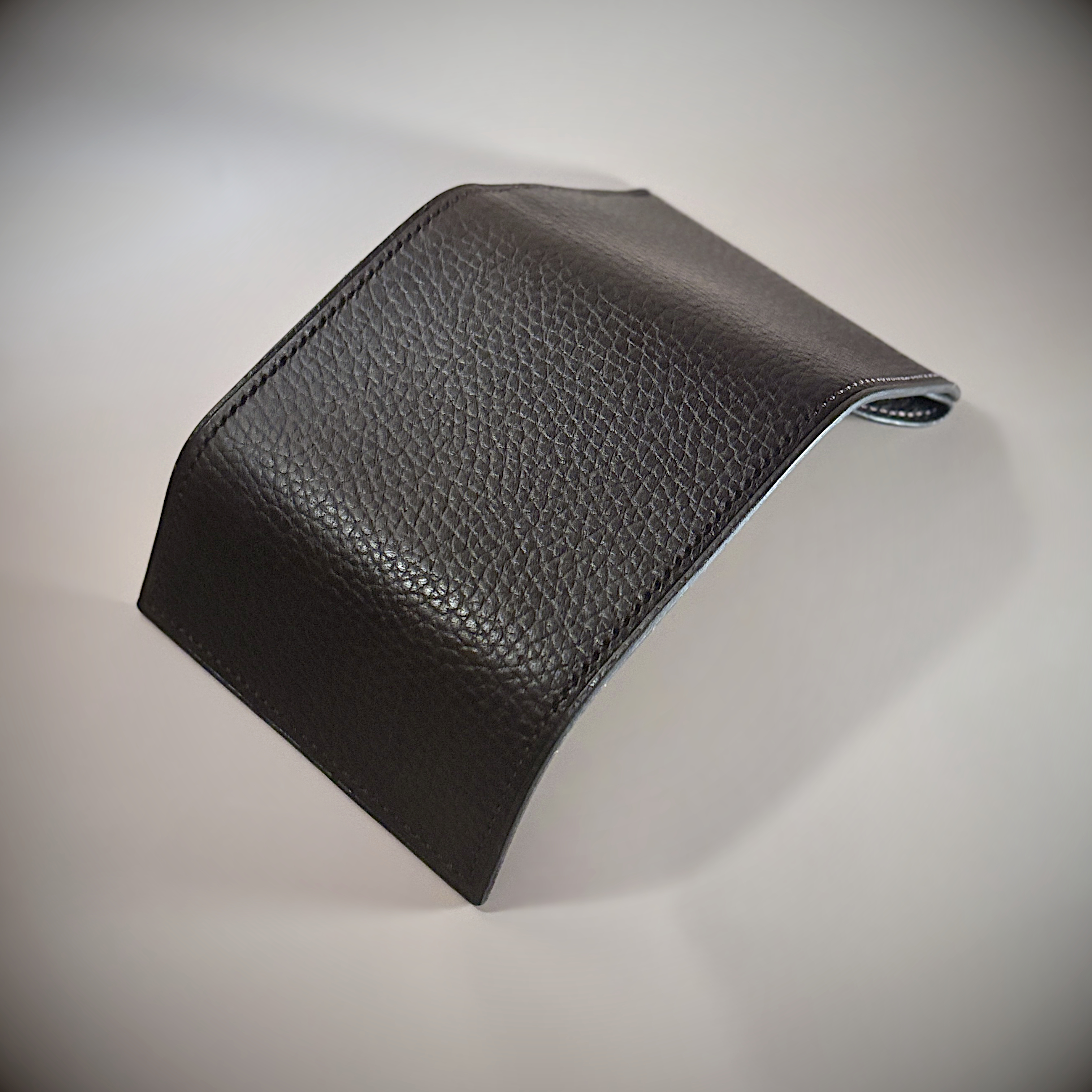 Unique hand-stitched brown and black wallet with money clip exterior shell view